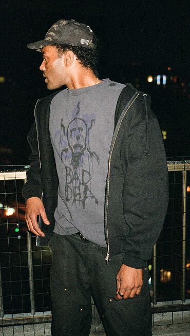 Image of model wearing the OTW x Bad Idea by Chito short sleeve T-shirt.