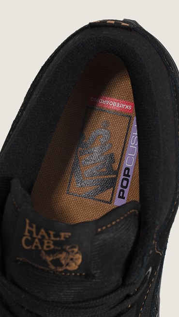Close-up of the brown insole of the Skate Half Cab with the Vans logo.