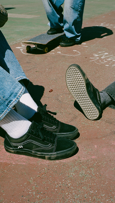 A close-up of the all-black Skate Old Skool on Vans Skate Team Riders.