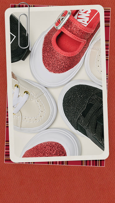 An overhead shot of glittery kids’ shoe styles in a photography studio.