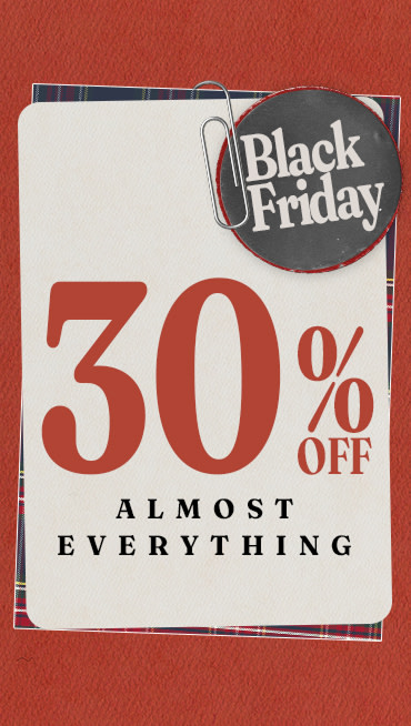 A tag that says 30% off everything with a paperclipped button that reads Black Friday on a red background.