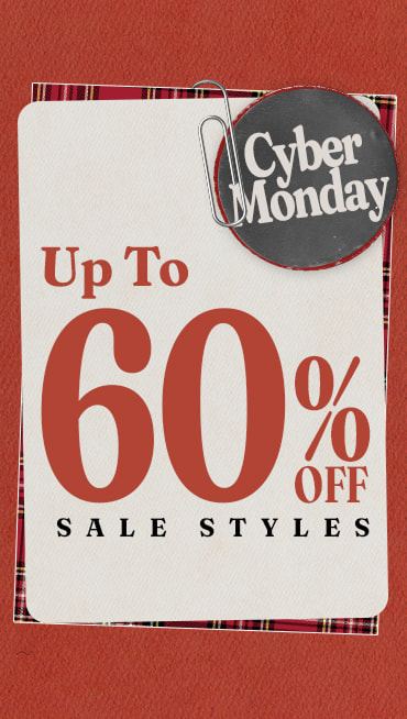 A card that reads up to 60% off sale styles with a paperclipped button that reads Cyber Monday on a red holiday background.
