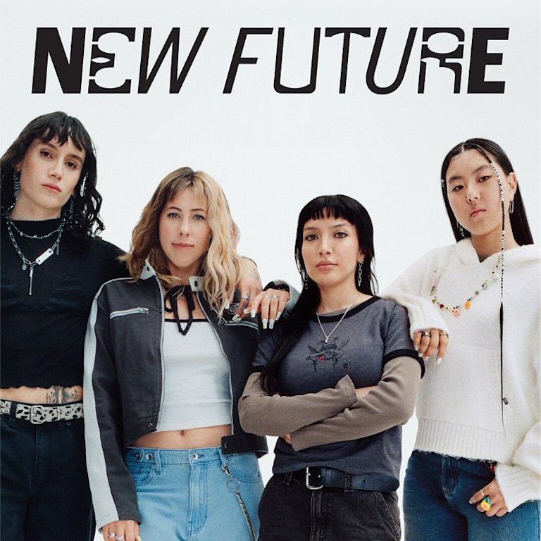Vans athletes Efron Danzig, Karina Rozunko, Tania Cruz, and Cocona Hiraki pose together in a photography studio with the text “New Future” above them.