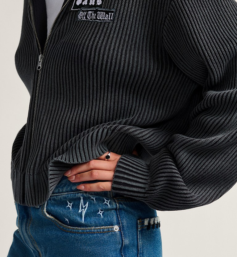 A close-up on the embroidered stars above the pocket on the Sirelle Embroidered Pants.
