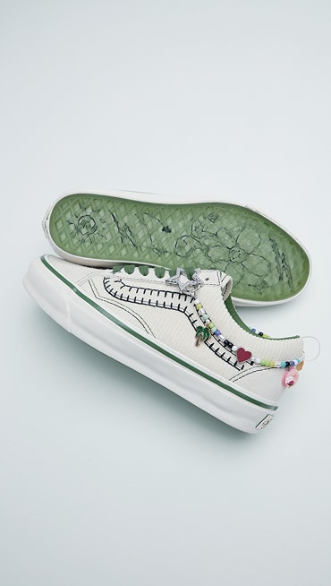 A pair of Cocona Hiraki’s Premium Old Skool lie on the floor of a photography studio from the New Future collection.