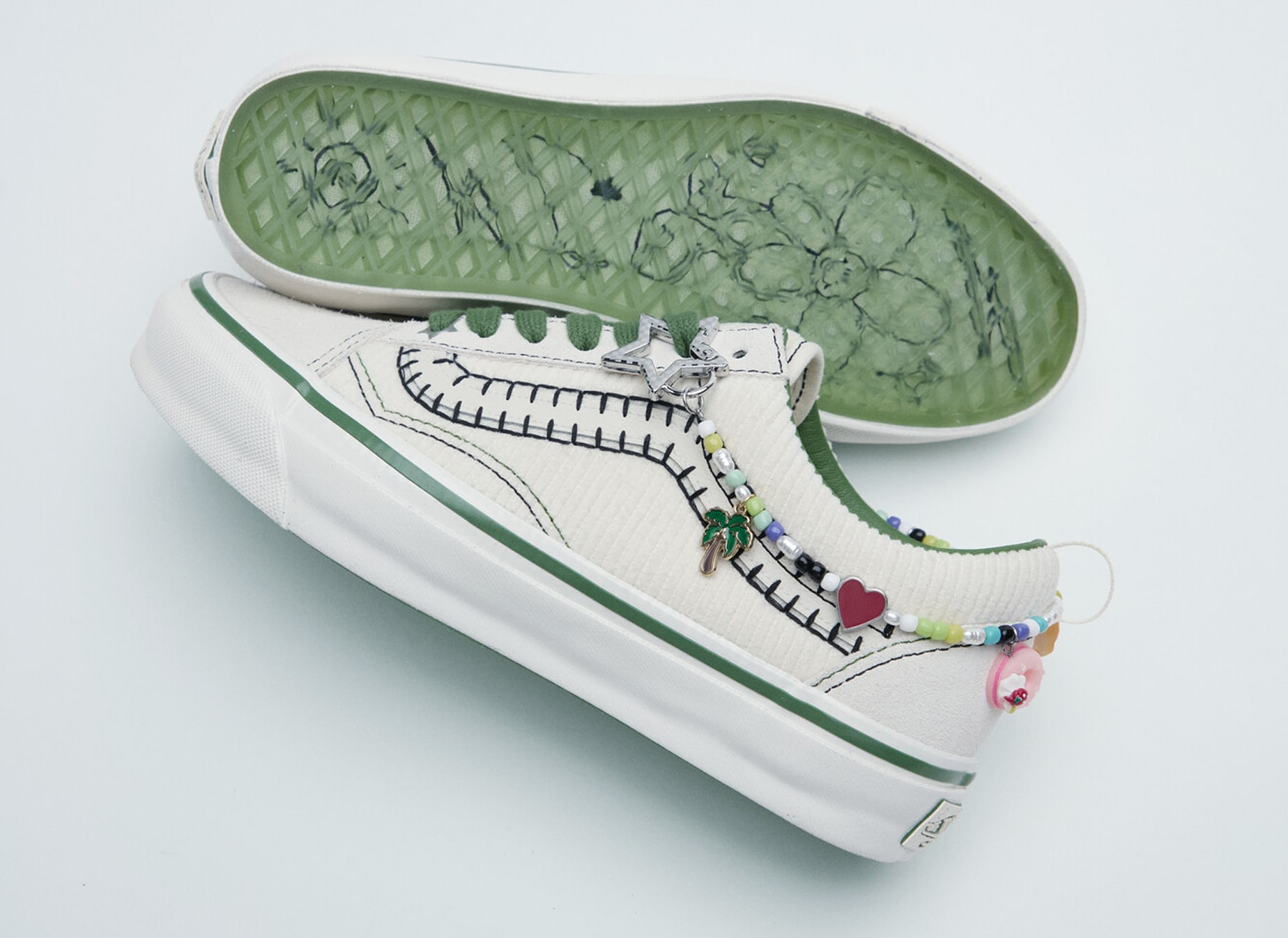 A pair of Cocona Hiraki’s Premium Old Skool lie on the floor of a photography studio from the New Future collection.