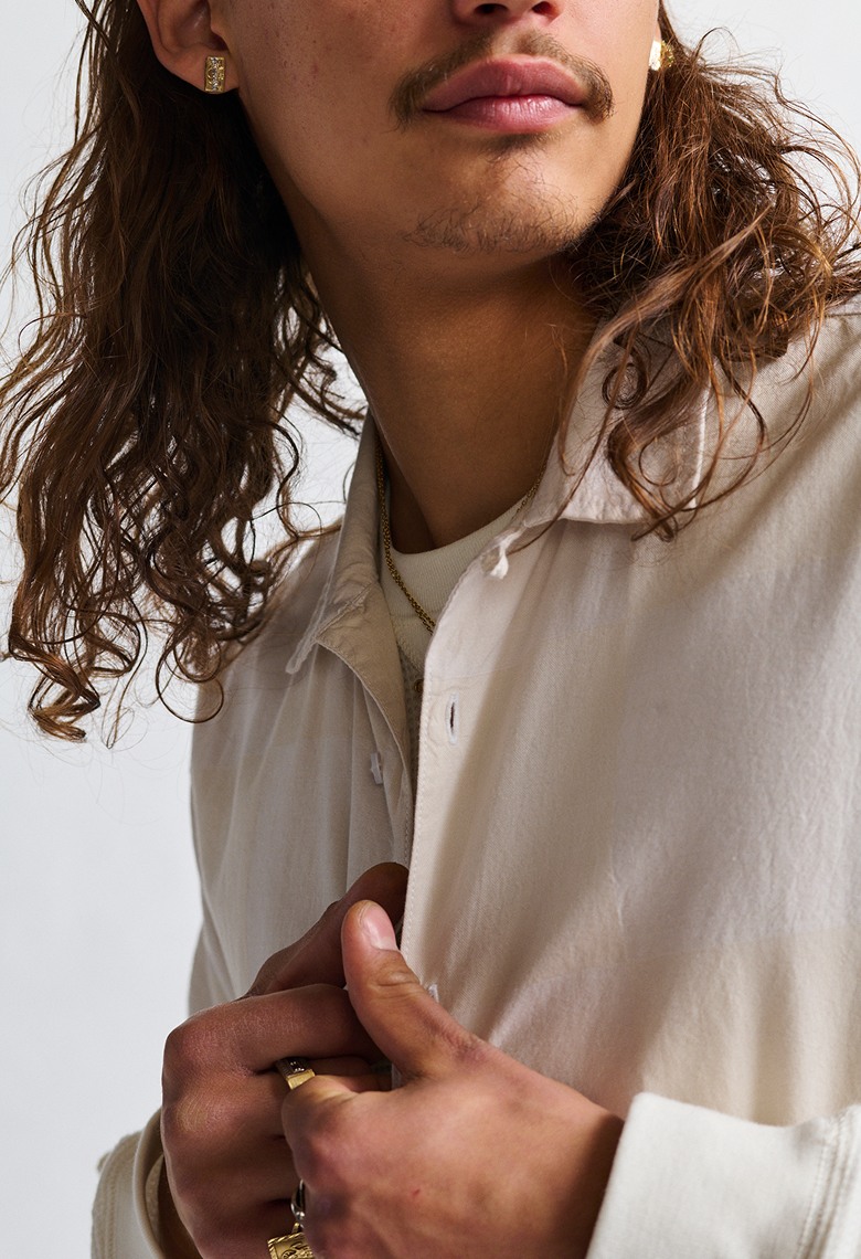 A close-up of a white button-up shirt.