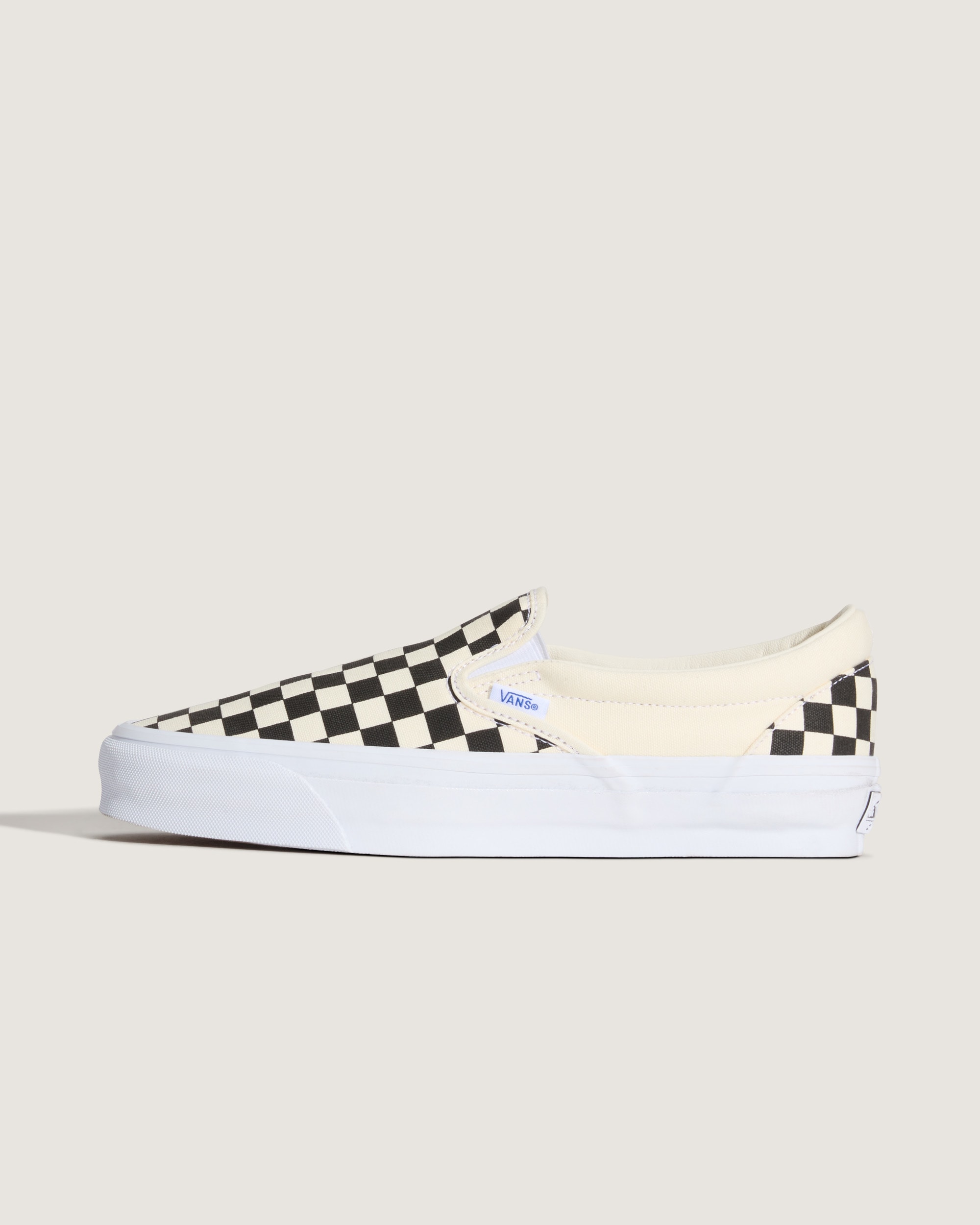 Premium Classic SlipOn Checkerboard Shoe VANS Checkerboard Black  Off White HERO