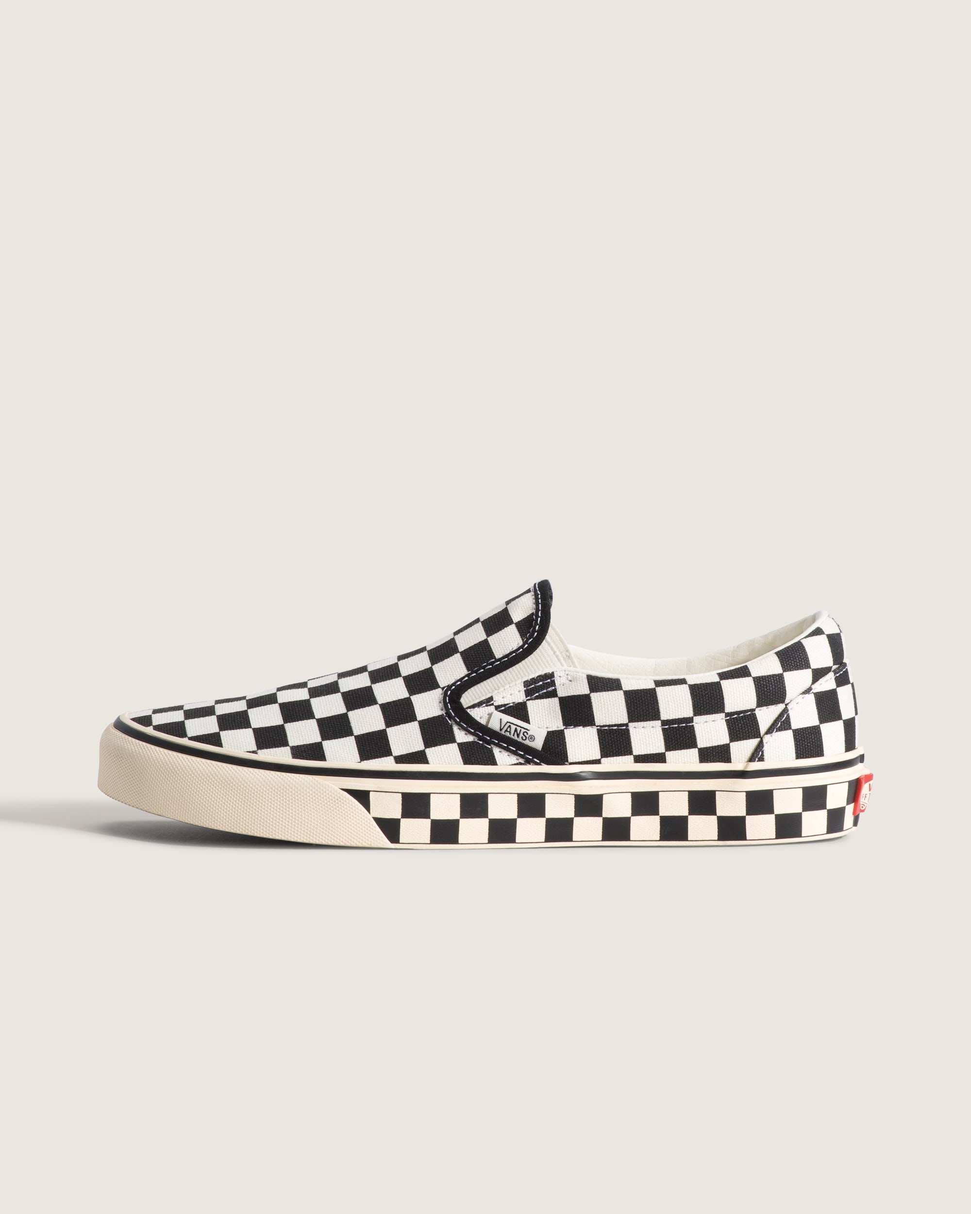 Classic SlipOn Checkerboard Shoe VANS Checkerboard Black  Marshmallow White HERO