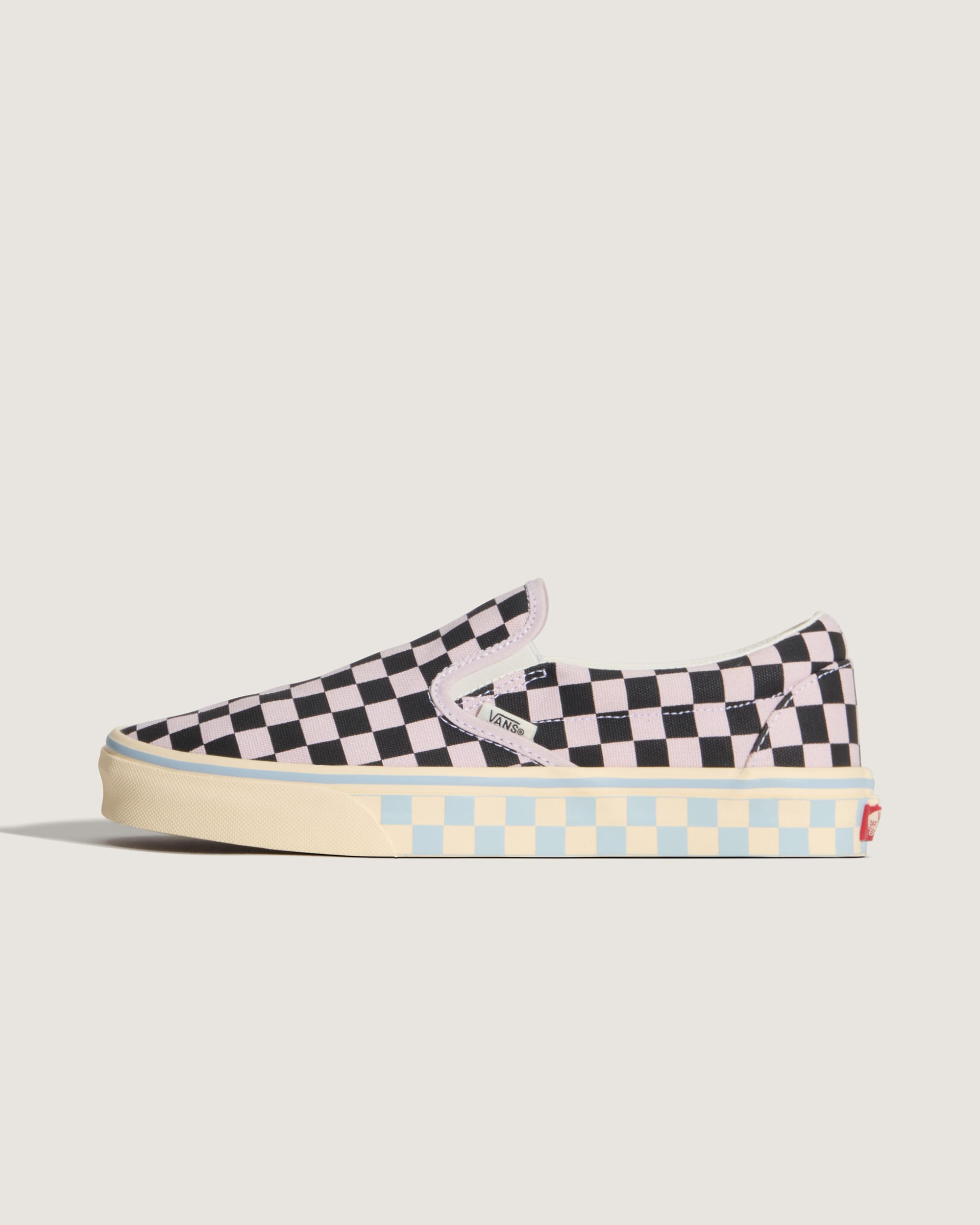 Classic SlipOn Checkerboard Shoe VANS Checkerboard Pale Petal Pink  Black HERO
