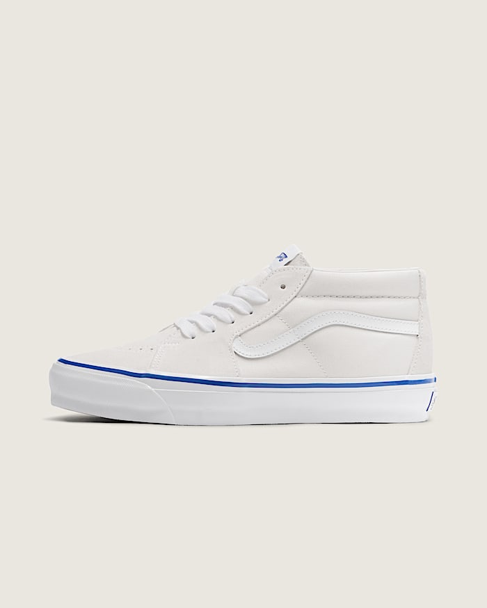 Off white vans with blue stripe top