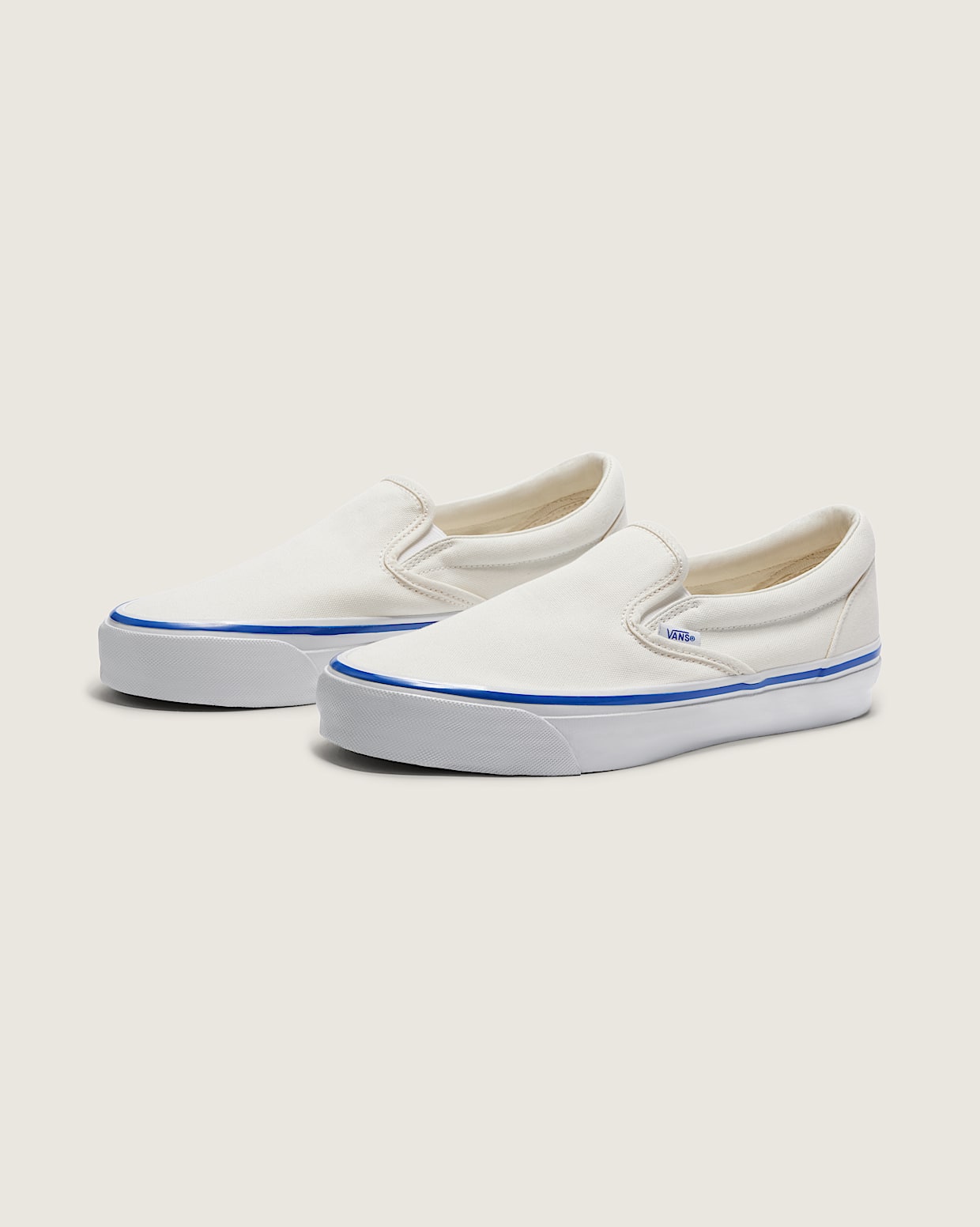 Slip on vans blue and white hot sale