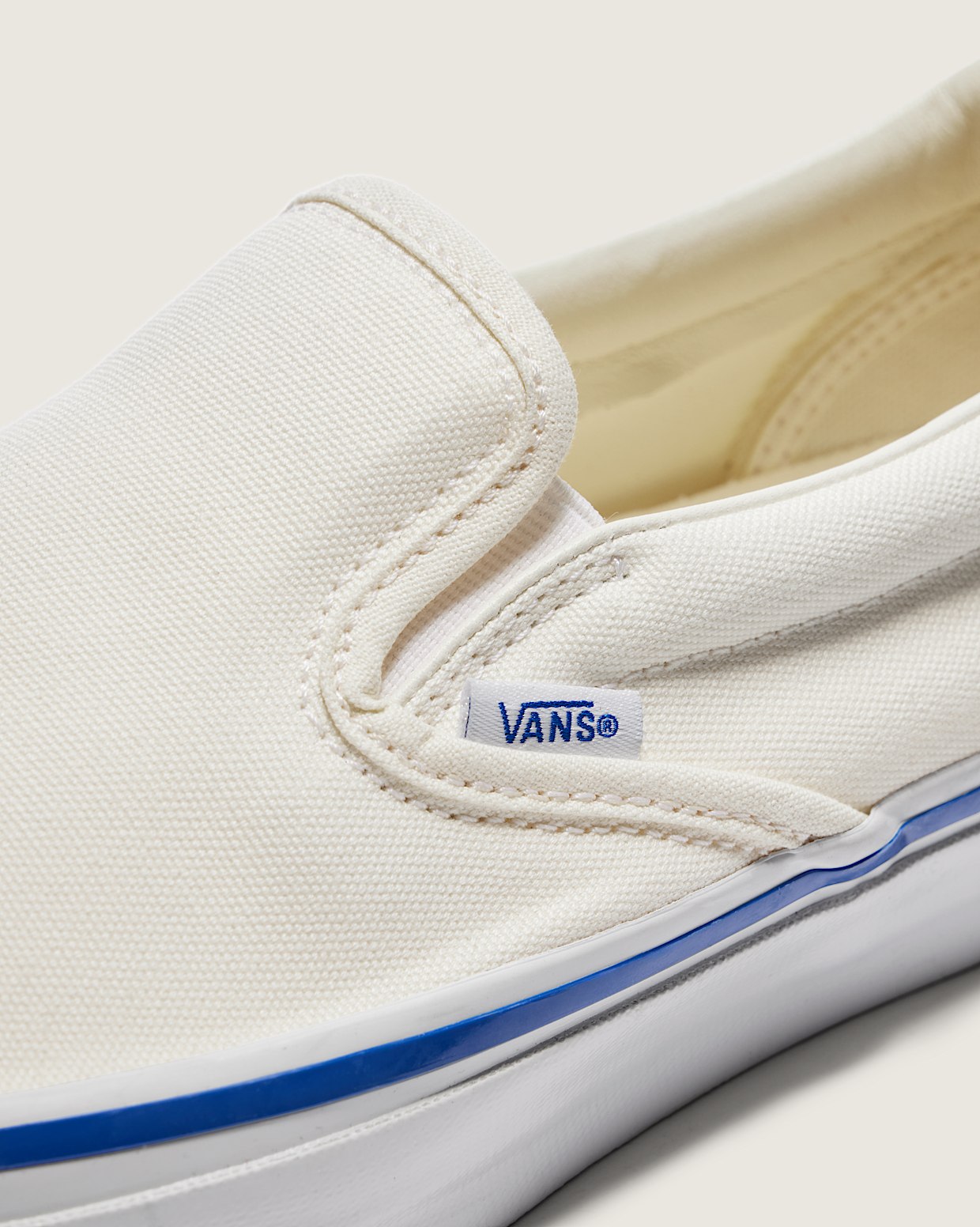 Cream slip on vans outlet